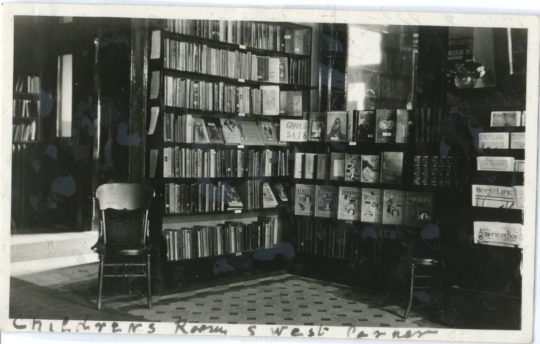 Shelves of books inside LPL in the 1920s